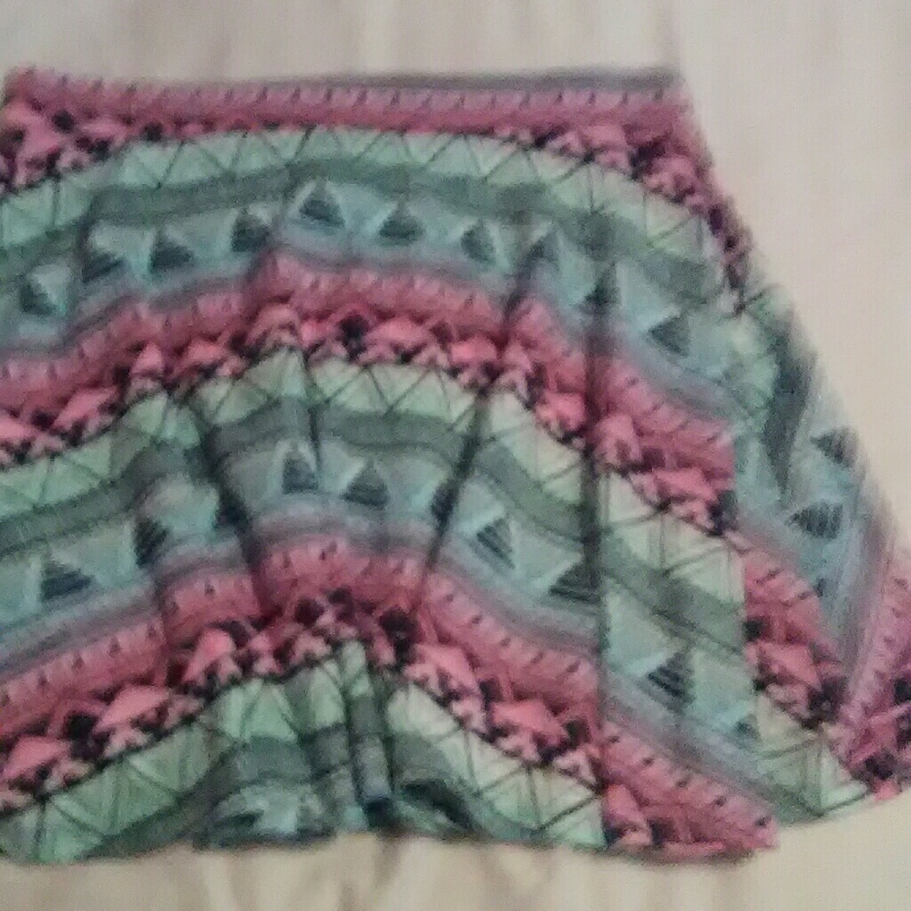 Pink, blue, and black scurt